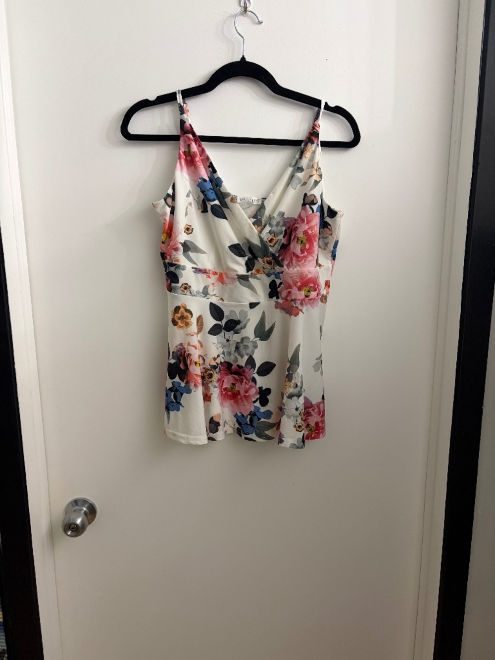 Woman’s floral peplum tank